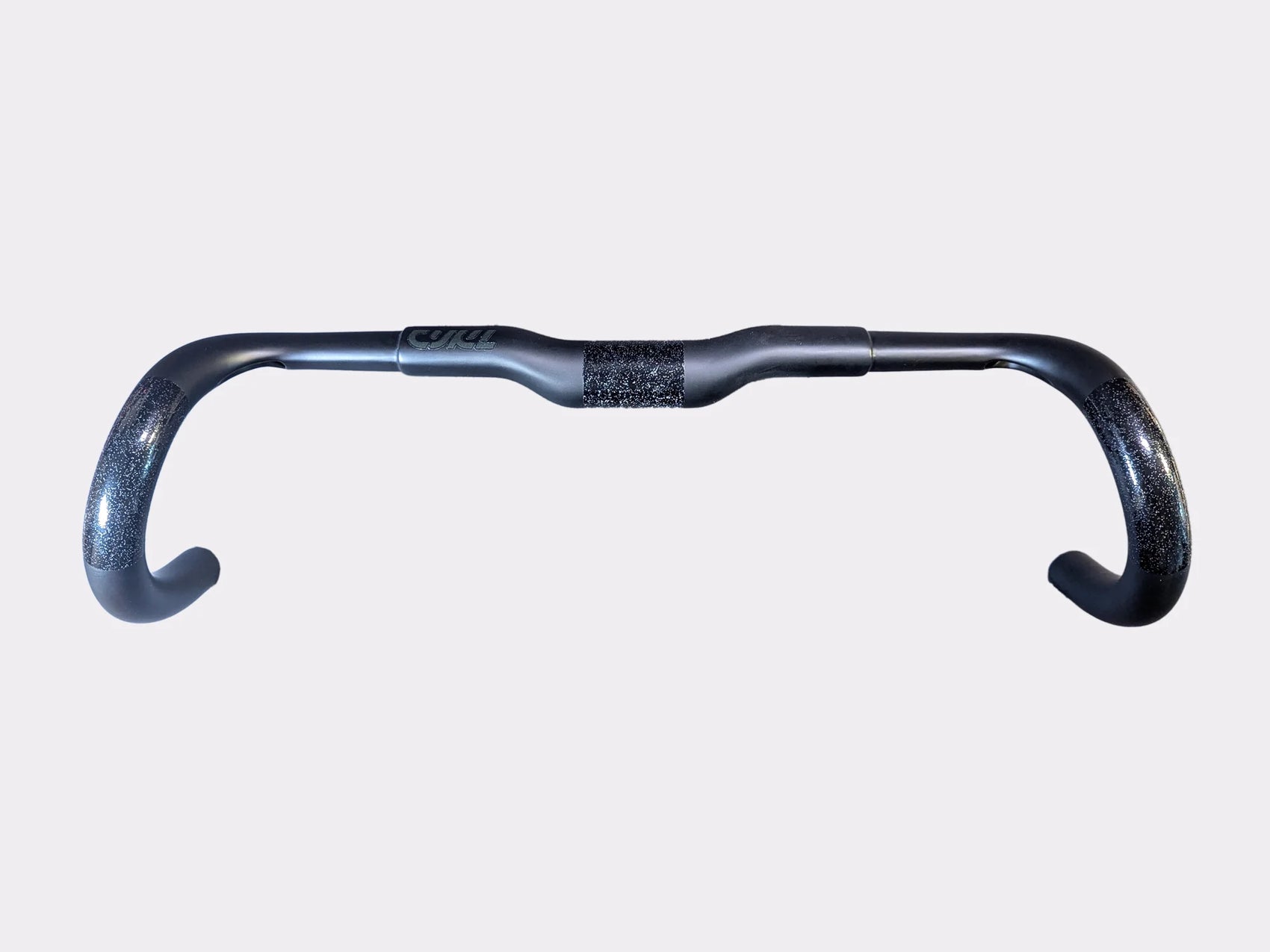Guidon gravel carbone pour vélo - vue du dessus montrant la courbure ergonomique