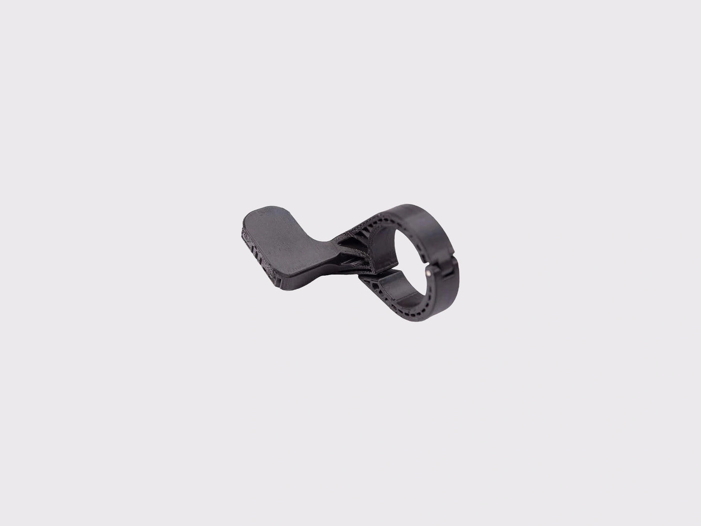 Support de cintre Cyclite Nano Handle Bar Mount 01 en polymère noir injecté, vue de trois-quarts mettant en avant la bague de fixation pour cintre de diamètre 31,8 mm.