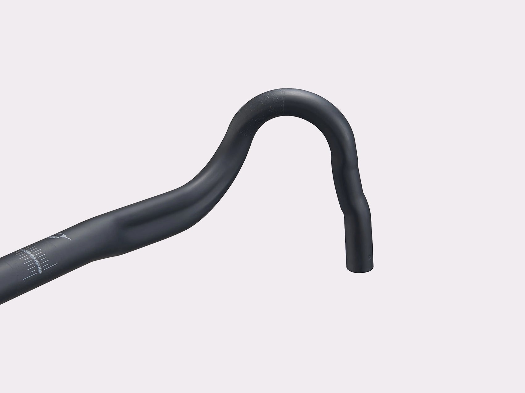 Close-up of the Ritchey WCS VentureMax alloy handlebar drop showing the ergonomic Bio-bend profile and matte black finish.