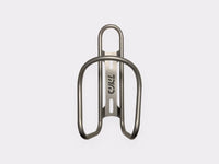 Porte-bidon titane CYKL – design minimaliste, fixation universelle, légèreté pour vélo gravel ou route