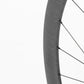 Détail jante carbone Sislent Wild LC finition noire rayons CX Ray
