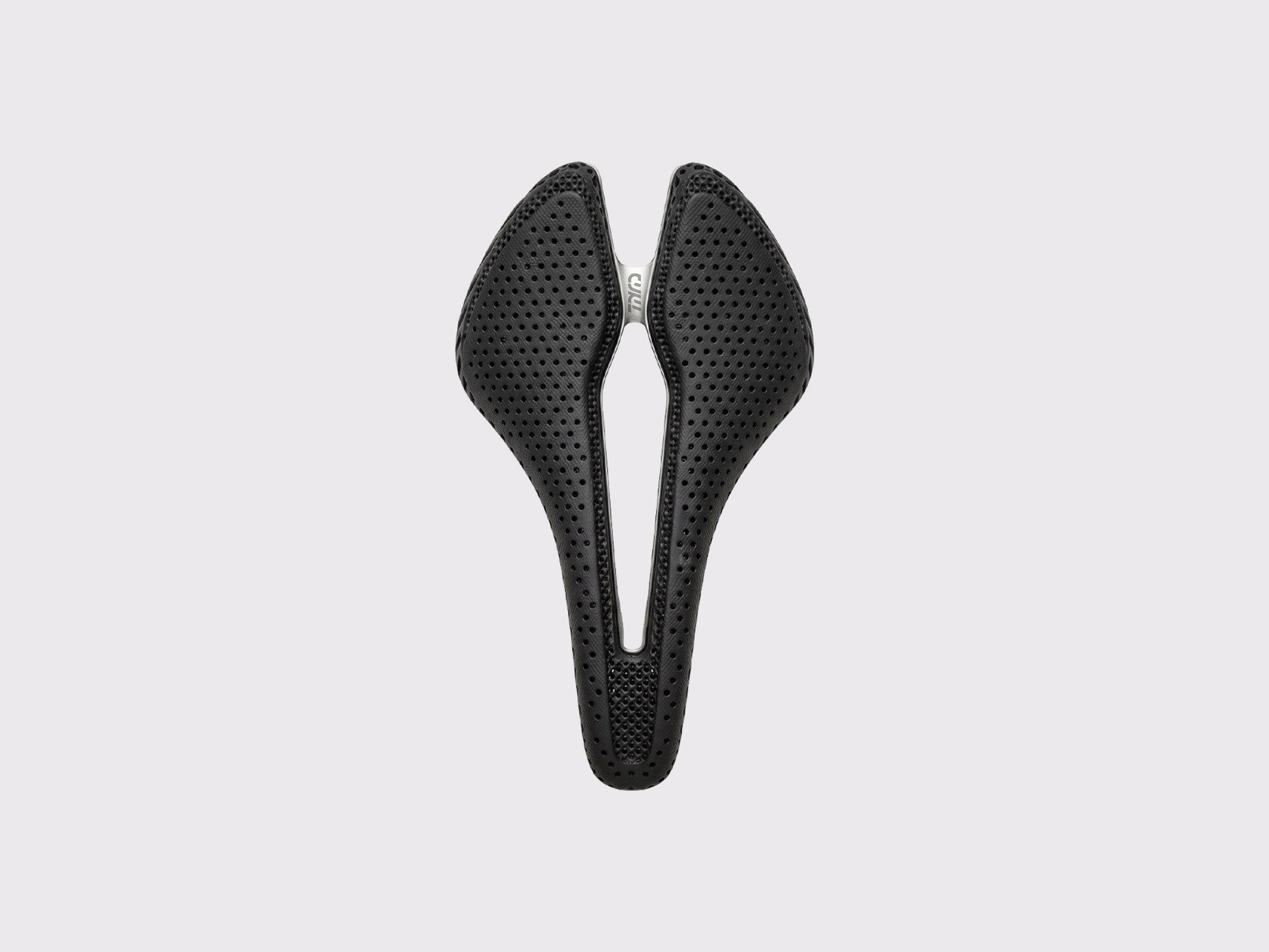 Selle Titane CYKL ERGO 3D Ti : vue de dessus mettant en évidence le rembourrage 3D lattice et le canal central évasé pour la décharge périnéale en ultra-distance.