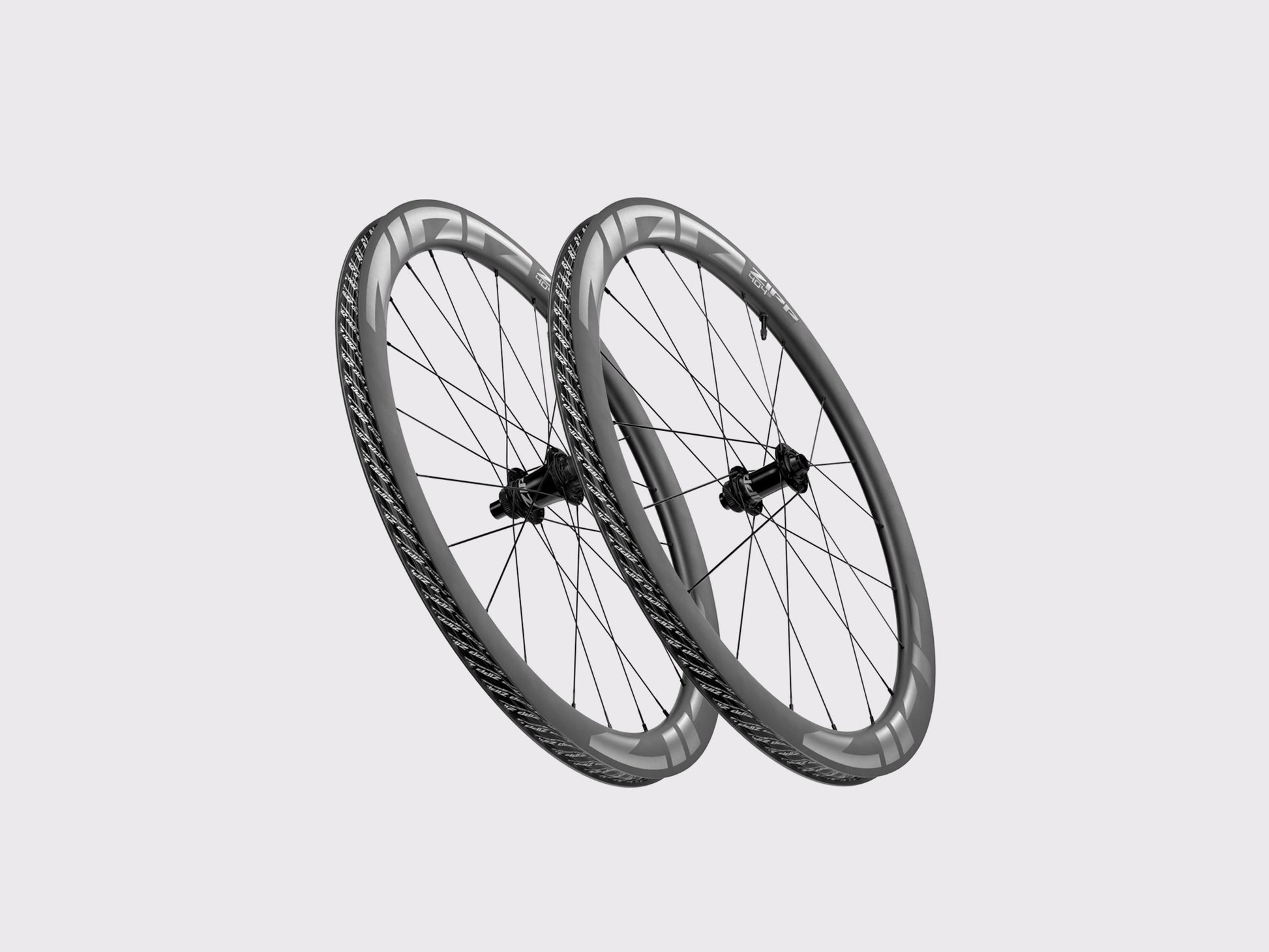 Vue de profil de la paire de roues aéro Zipp 404 S Tubeless Disc finition grise. (Gris)